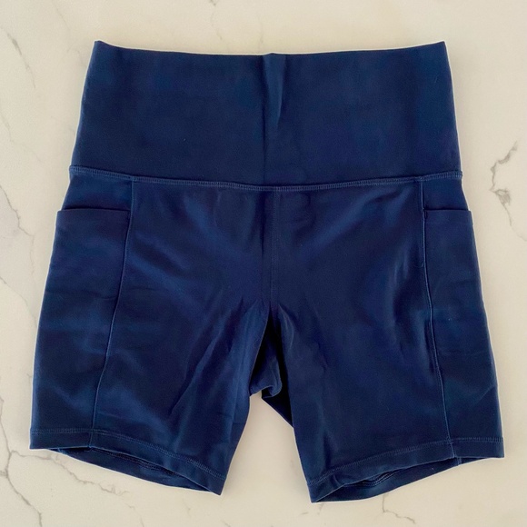 ATHLETA “Salutation Stash Pocket II 7” Short” navy, high rise, size SM - Picture 1 of 10